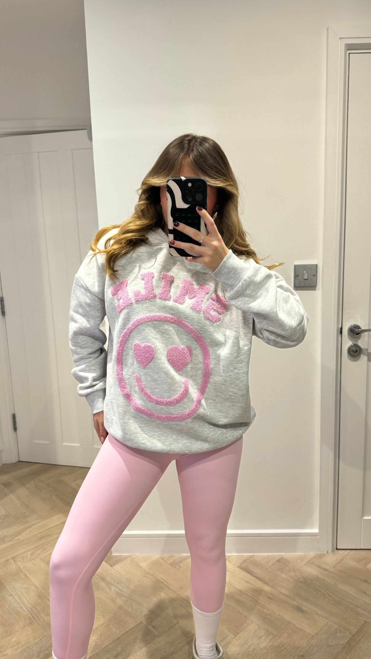 SMILE FLEECE LINED EMBOSSED HOODIE