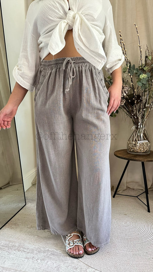 CLEO LINEN BUTTON DETAIL FLARE TROUSERS